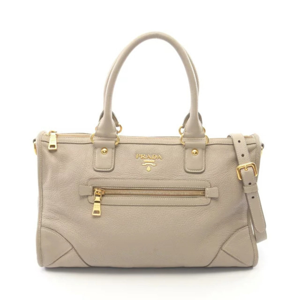 Prada beige pebbled leather handbag dual top handles Cream